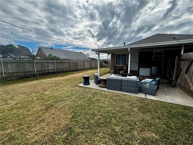 view of yard with an outdoor hangout area and a patio