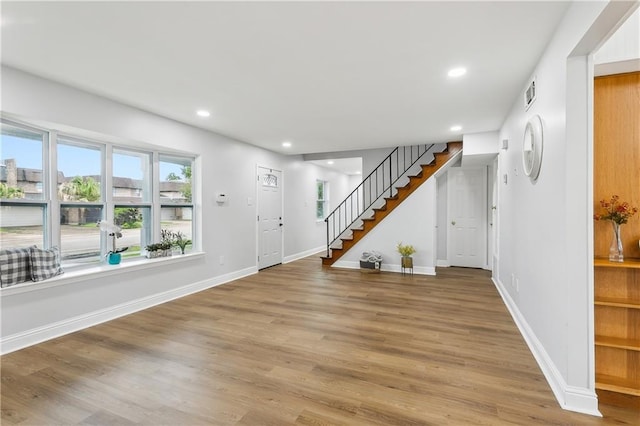 foyer entrance featuring light hardwood / wood-style floors