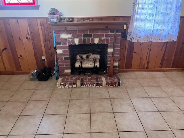 details featuring a fireplace and wooden walls