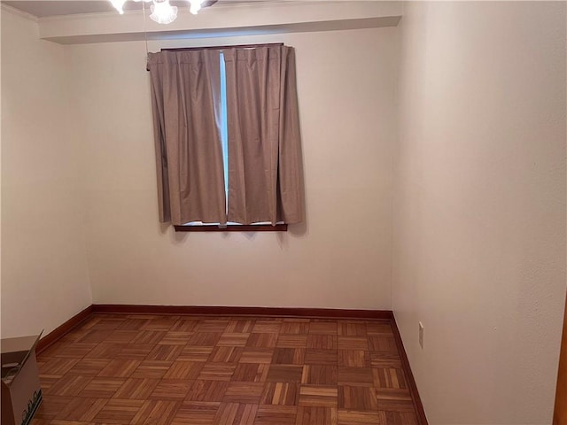 empty room with dark parquet floors