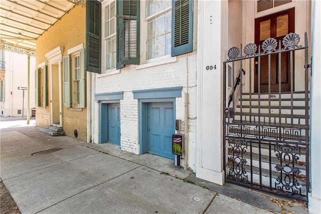 604 Esplanade Ave Unit 101, New Orleans, LA 70116 - property entrance featuring brick siding