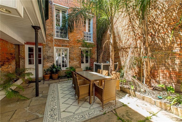 604 Esplanade Ave Unit 101, New Orleans, LA 70116 - view of patio featuring outdoor dining space