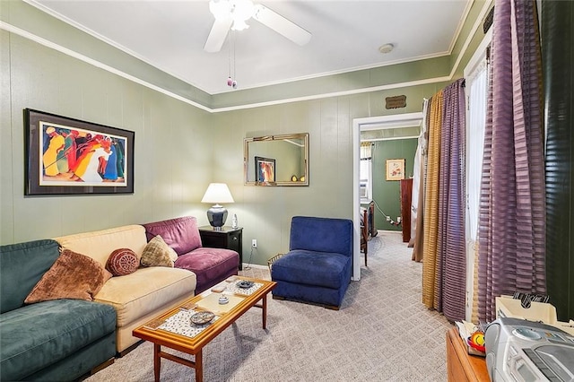 living room featuring crown molding and ceiling fan