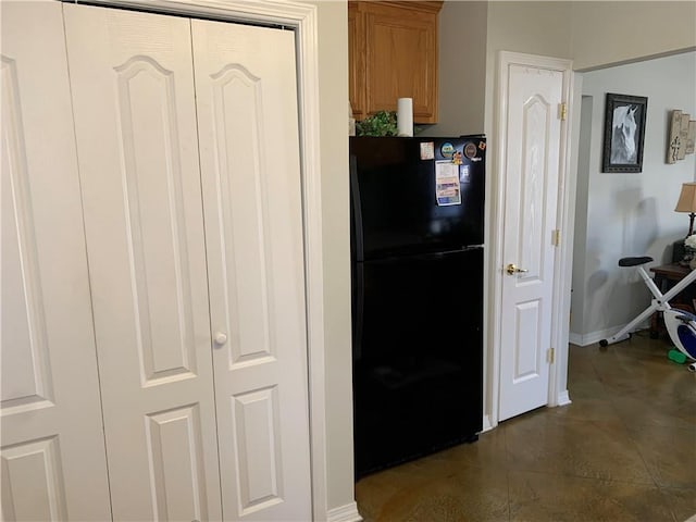 kitchen with black fridge