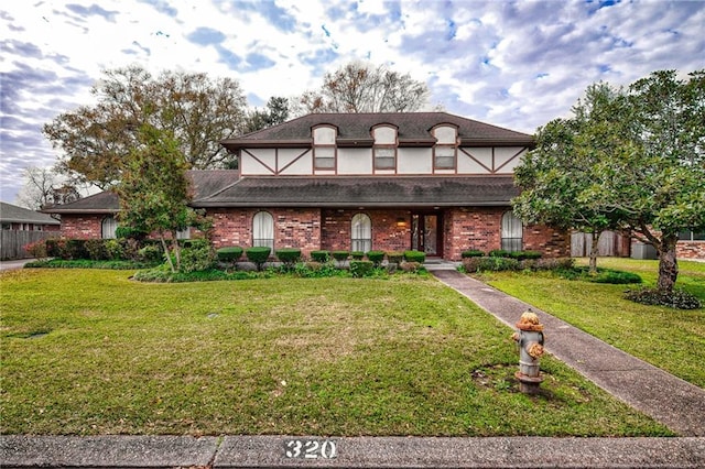 view of front of house with a front lawn