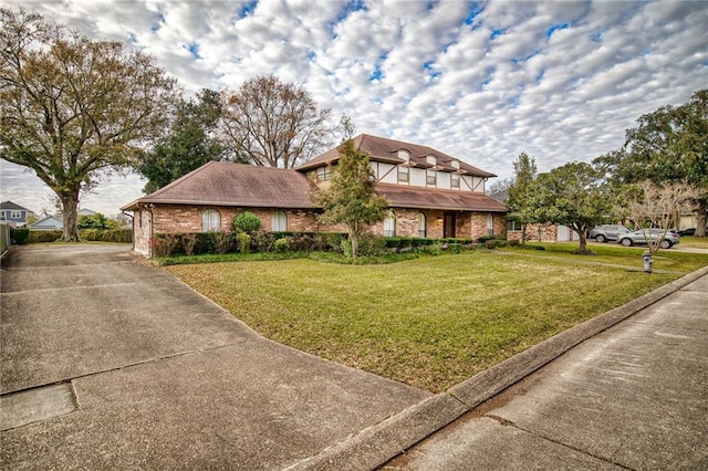 view of front of property with a front lawn