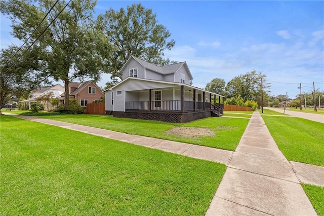 view of front of house featuring a front lawn and a porch