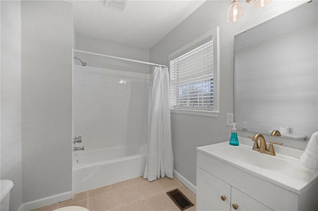 bathroom featuring vanity, shower / bath combination with curtain, and tile patterned floors