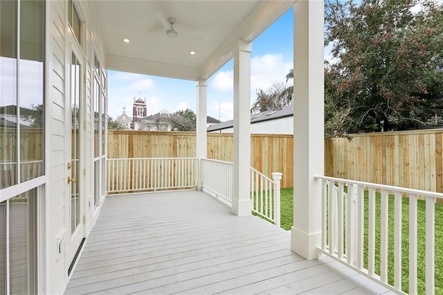 wooden deck with ceiling fan