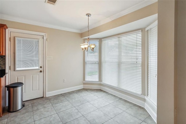 unfurnished dining area with visible vents, crown molding, baseboards, a chandelier, and light tile patterned floors