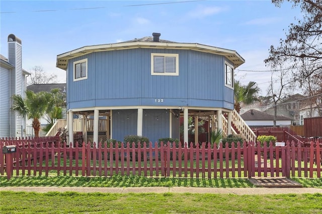 back of house with covered porch