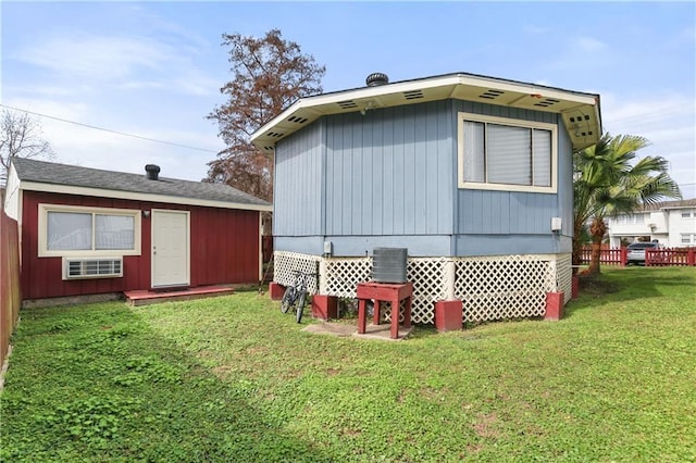 back of property with a yard