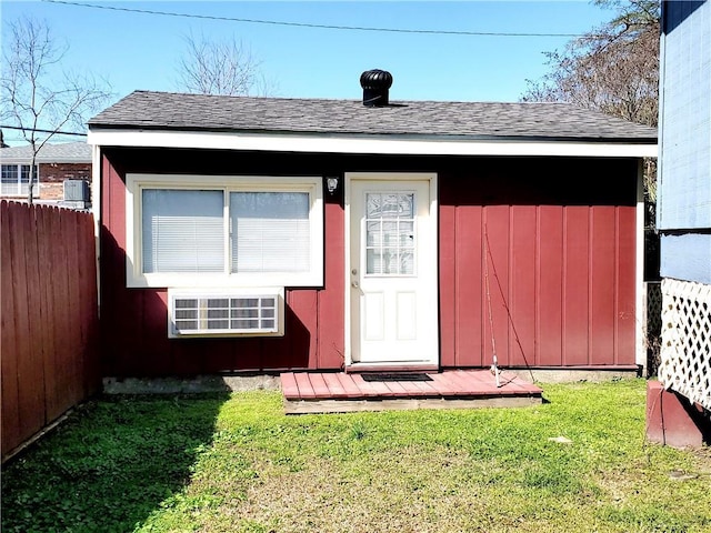 view of outdoor structure with a lawn