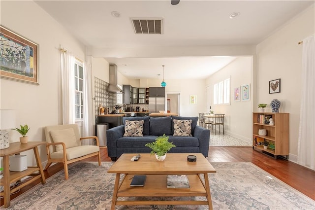 living room with wood-type flooring