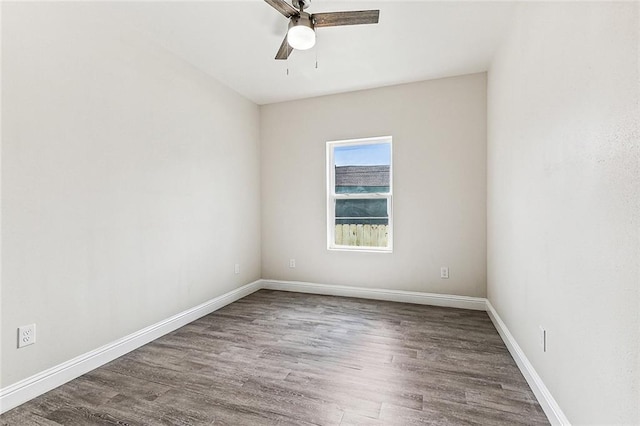 220406 Pauger St, New Orleans, LA 70116 - unfurnished room with wood finished floors, ceiling fan, and baseboards