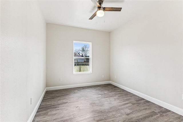 220406 Pauger St, New Orleans, LA 70116 - empty room featuring wood finished floors, ceiling fan, and baseboards