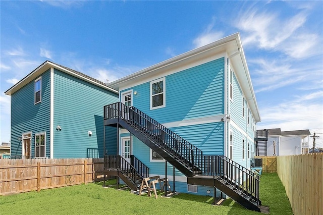 220406 Pauger St, New Orleans, LA 70116 - back of house featuring stairs and central AC