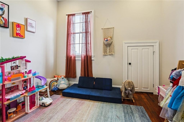 playroom featuring dark hardwood / wood-style flooring