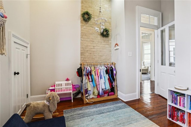 interior space with dark hardwood / wood-style floors