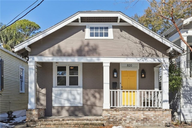 bungalow-style house with covered porch