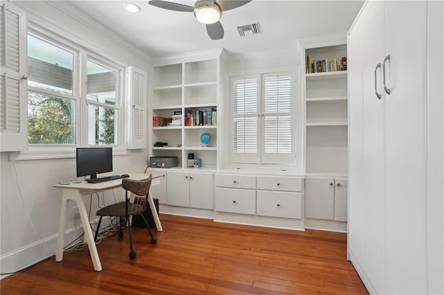 home office with crown molding, hardwood / wood-style floors, and ceiling fan