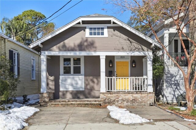 bungalow-style house with covered porch