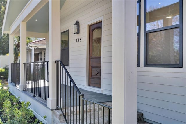 property entrance with covered porch