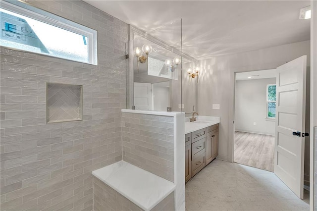 bathroom with vanity and walk in shower