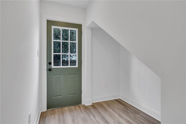 additional living space with light wood-type flooring