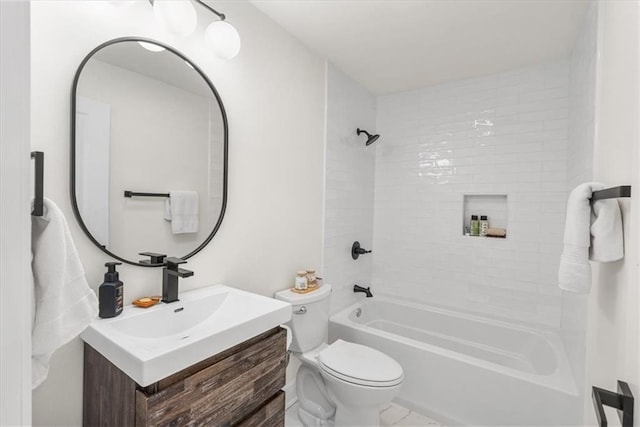 full bath featuring toilet, marble finish floor, shower / washtub combination, and vanity