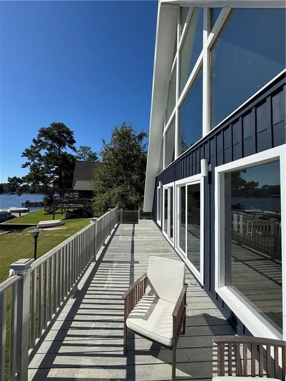 exterior space with a yard and a water view