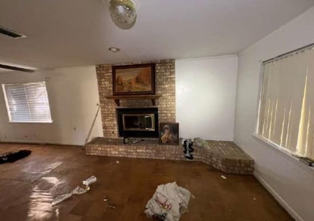 unfurnished living room with a fireplace