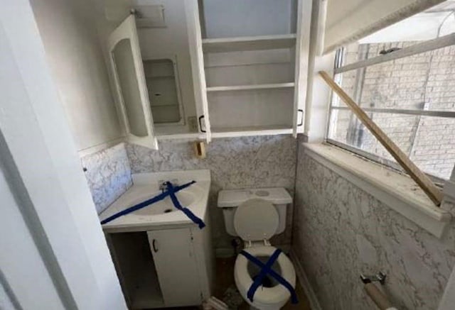 bathroom featuring toilet