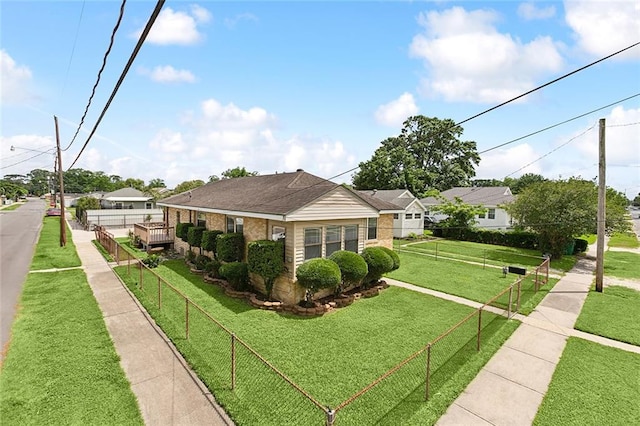 view of front facade with a front yard