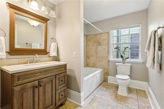 full bathroom with washtub / shower combination, tile patterned floors, toilet, and vanity