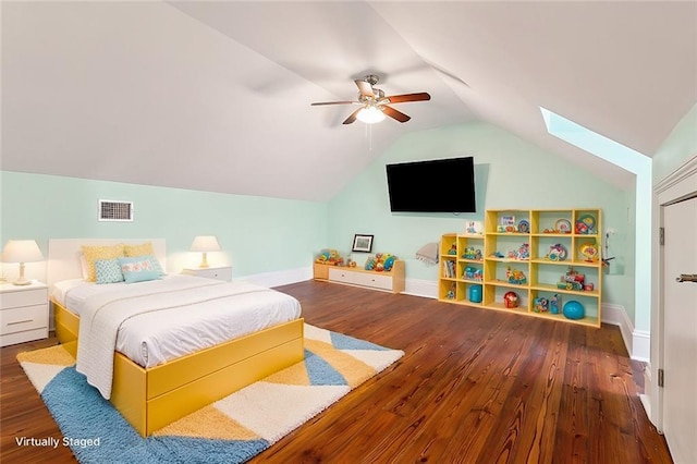 bedroom with dark hardwood / wood-style flooring, lofted ceiling, and ceiling fan