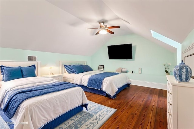 bedroom featuring lofted ceiling, dark wood-type flooring, and ceiling fan