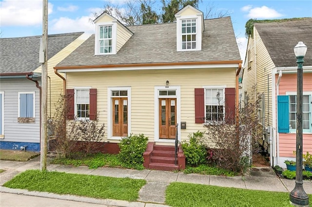 view of new england style home