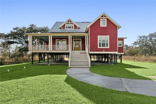 view of front of house featuring a front lawn and a porch