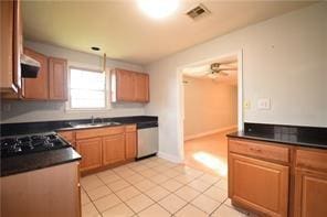 kitchen with sink, light tile patterned floors, dishwasher, black gas cooktop, and ventilation hood