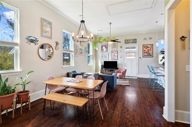 dining room with crown molding, ceiling fan, and dark hardwood / wood-style flooring