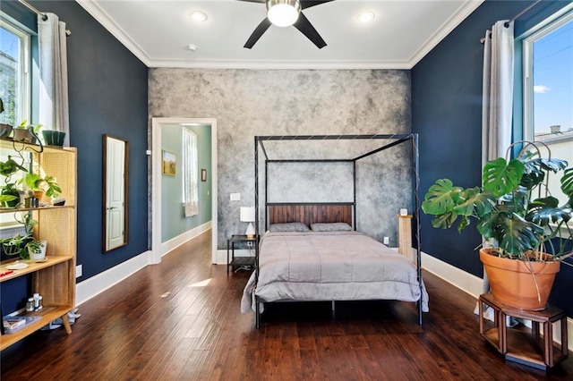 bedroom with crown molding and hardwood / wood-style floors