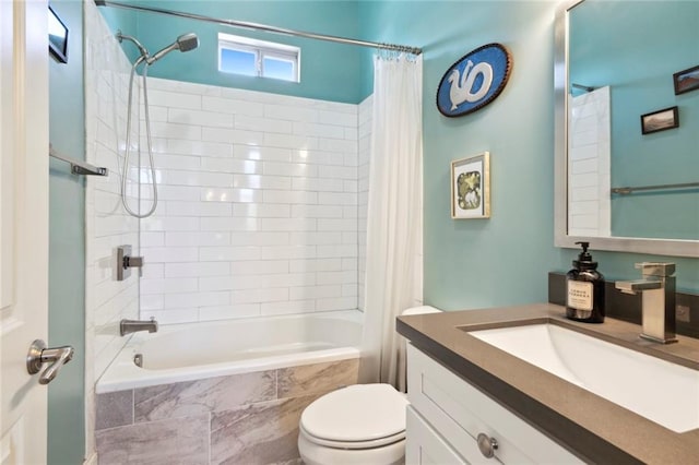 full bathroom featuring vanity, toilet, and shower / bath combo