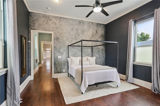 1841 Rosiere St, New Orleans, LA 70119 - bedroom featuring hardwood / wood-style flooring, ornamental molding, baseboards, and a ceiling fan
