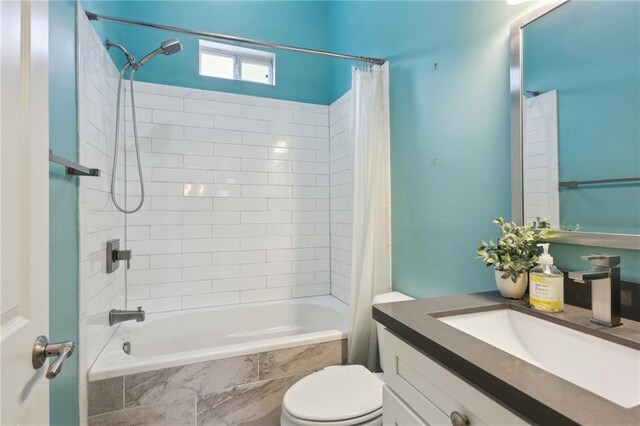 1841 Rosiere St, New Orleans, LA 70119 - bathroom featuring vanity, tiled shower / bath, and toilet