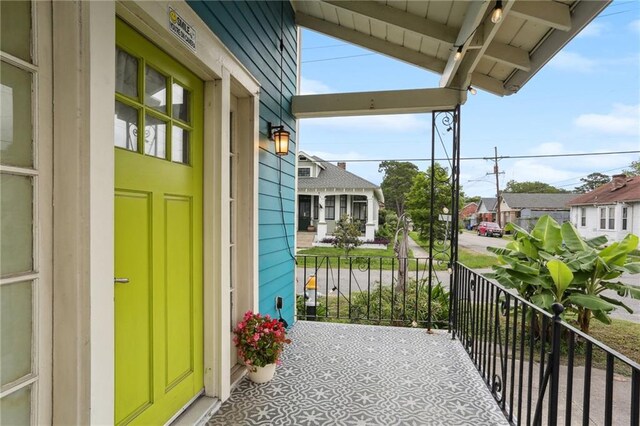 1841 Rosiere St, New Orleans, LA 70119 - covered porch with a residential view