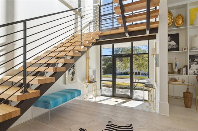 staircase featuring hardwood / wood-style floors