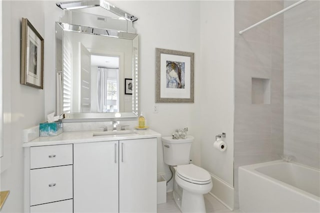 full bathroom featuring vanity, tiled shower / bath combo, and toilet