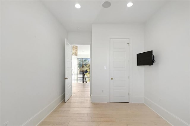 hallway featuring light wood-type flooring