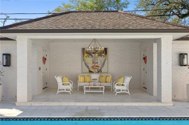 exterior space featuring a gazebo, outdoor lounge area, and a patio